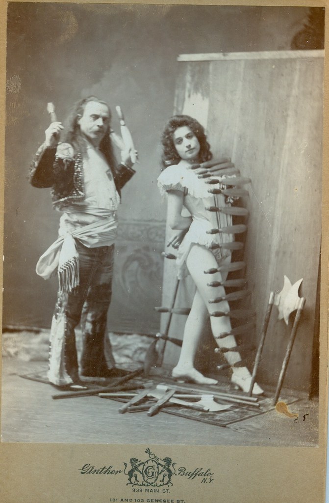 Antique cabinet photo from victorian age Gustavo Arcaris  and  Kate  ...Knife Throwing in their circus act...Please dont try this at Home