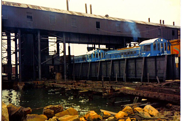 Locomotives crossing float bridge