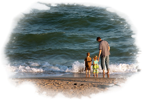 Family By The Beach by S.A. Street Photographer