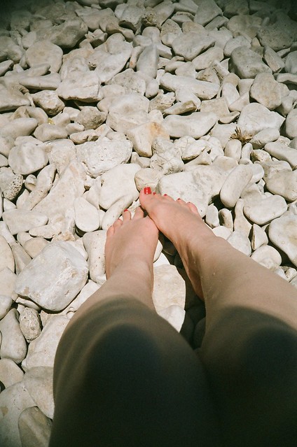 My feet on a beach on Brac