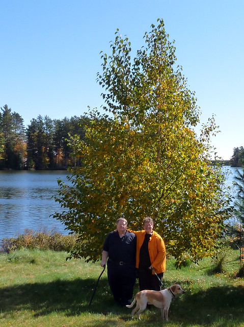 The annual photo by the tree we planted in 2002