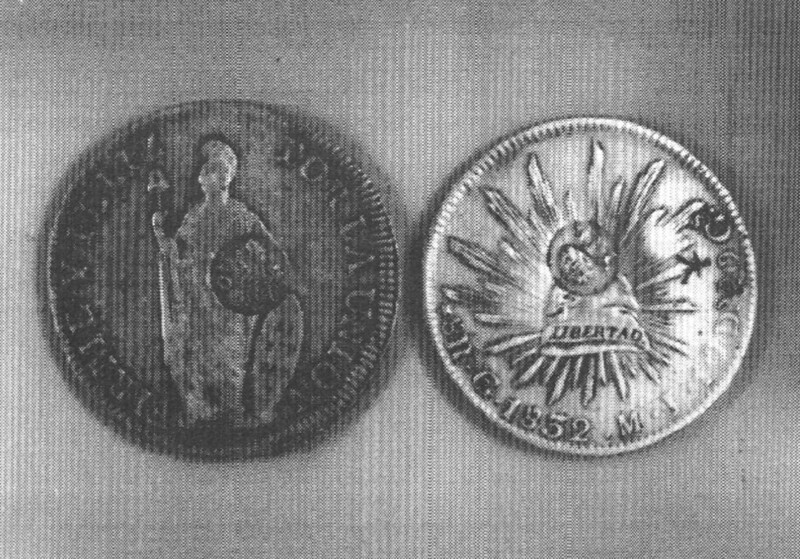 The counter-stamped coin on the left is of Ferdinand VII was used between 1830 till 1834 after his death.  On the right is of Isabel II, which replaced Ferdinand VII.

Micronesian Area Research Center (MARC)