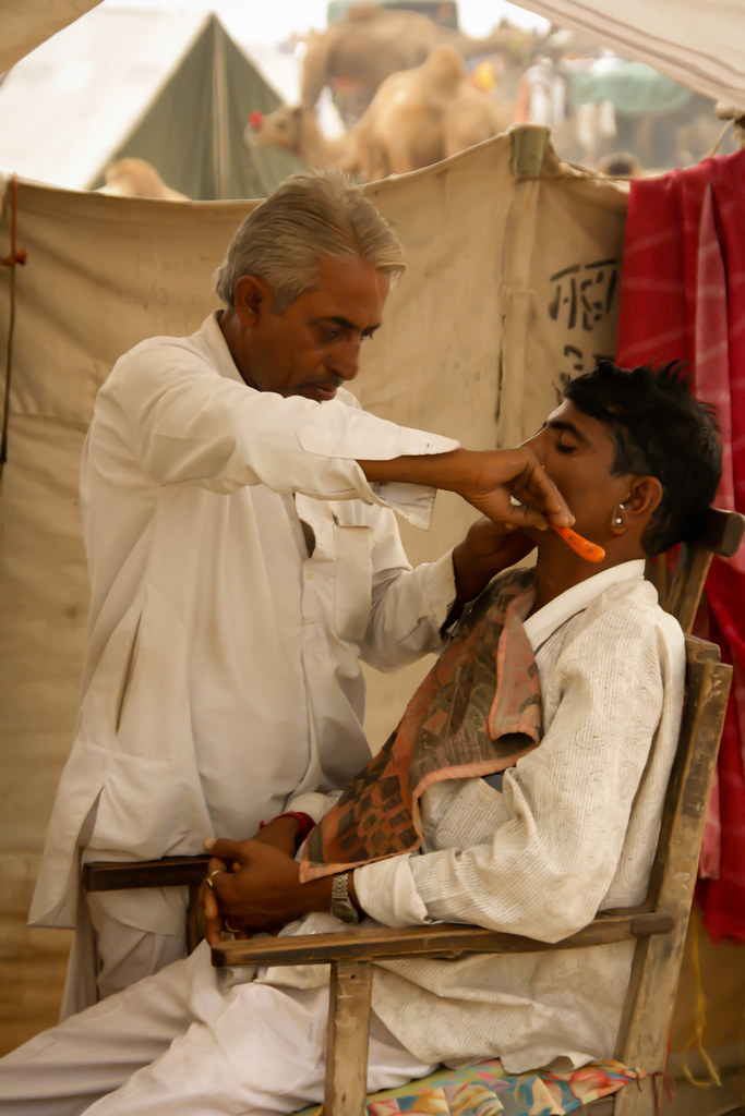 Getting a Shave at the Camel Market