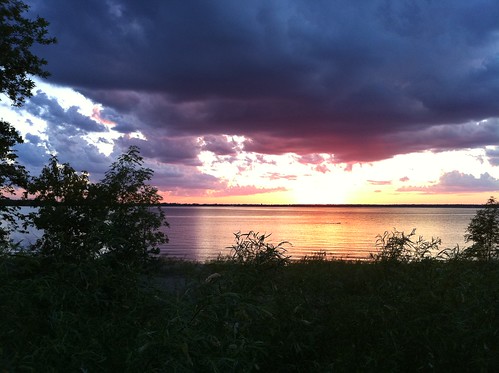 sunset sun lake water minnesota clouds ranier rainylake
