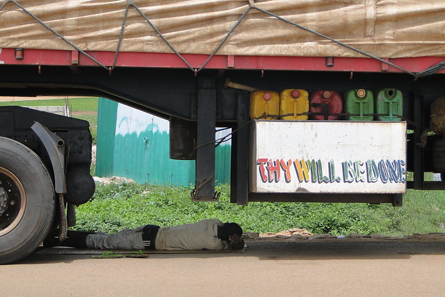 Thy Will Be Done - Man Sleeps under Semi-Trailer - Bolgatanga - Ghana