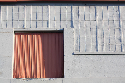 door windows orange building grey industrial gray