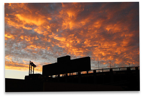 Lambeau Sunset by bogray, A summer sunset over Lambeau Field, the home of the NFL Green Bay Packers as the Monday Night Footba