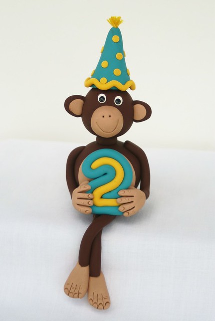 Mod Monkey Cake Topper holding a number