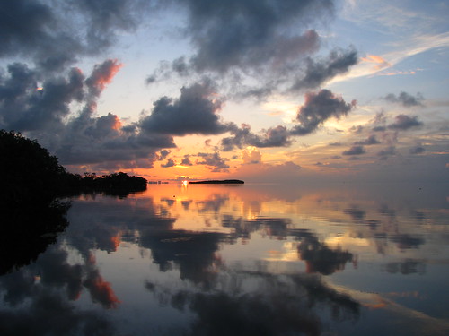 reflection clouds sunrise dock estate miami deering 07092010