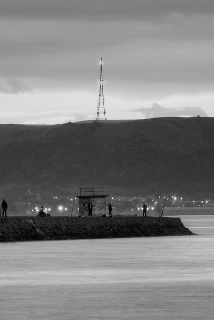 TV tower and fishermen