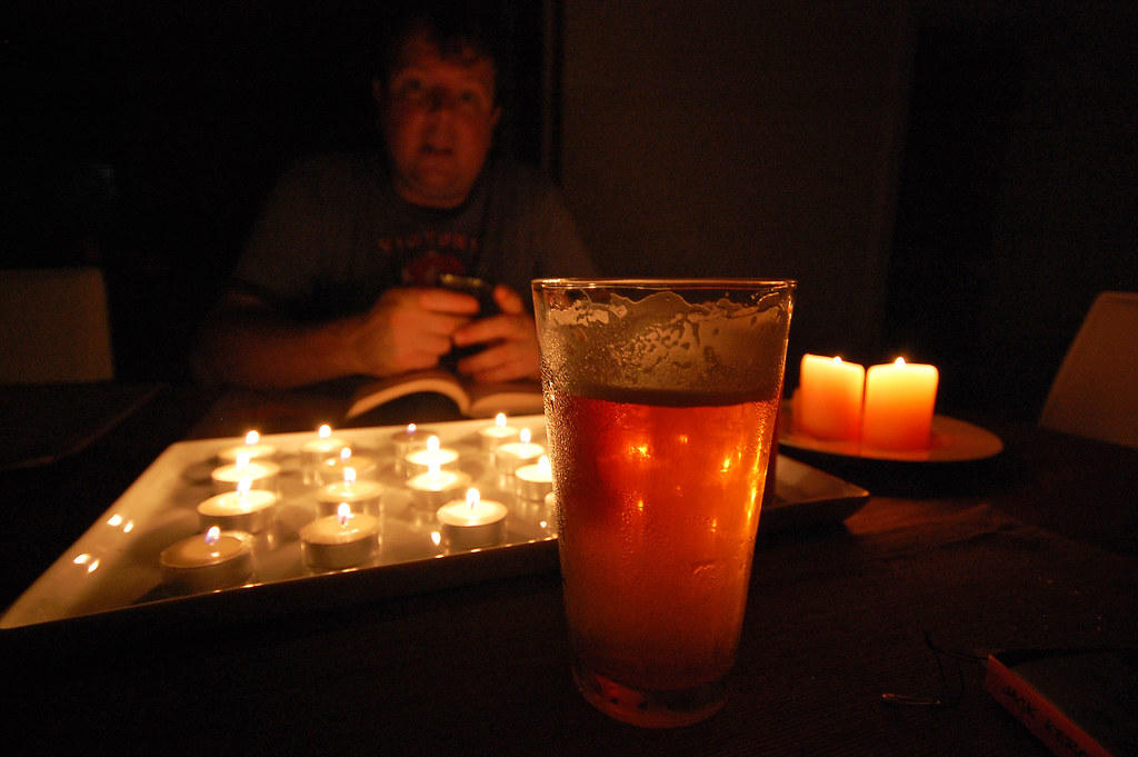 power outage, Survival tools: candles, smart phone, beer., Rachel