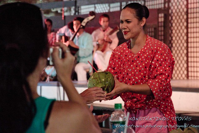 Offering Fresh Buko Juice to a tourist