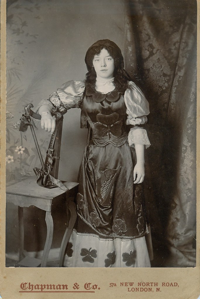 A very unique image of a woman dressed in shamrocks Irish  cabinet photo