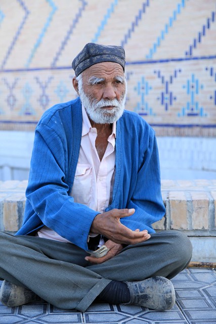Silent gesture for donations, Samarkand, Uzbekistan