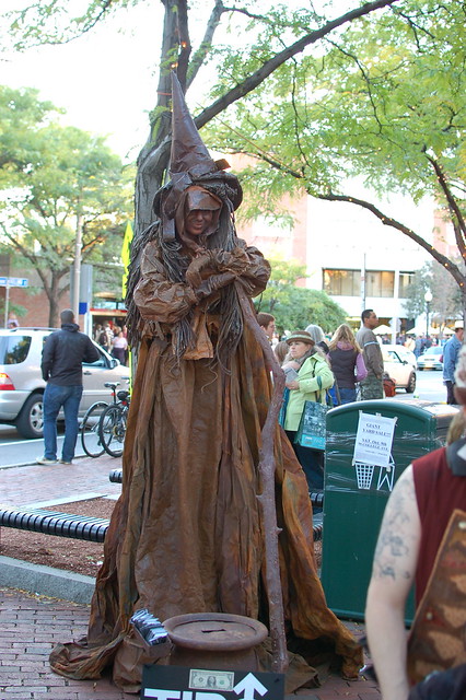 Human statue: big brown witch, in Davis Square, Somerville