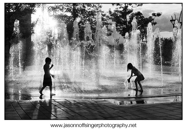 Kids playing in a fountain
