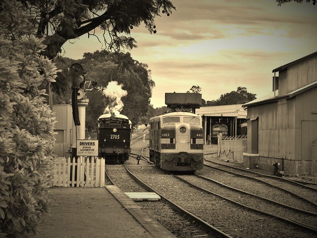 Steam locomotive 2705 leads a passenger shuttle into Thrilmere as a staff exchange takes place with the crew of 4403