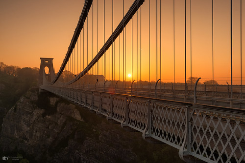 the clifton suspension bridge spanning picturesque avon gorge is symbol city bristol for almost 150 years this grade i listed structure has attracted visitors from all over world its story began 1754 with dream wine merchant who left legacy build england uk nikon d5200 lightroom night landscape architecture outdoor skyline building infrastructure water dusk serene d610 colour color sky black background sunrise river
