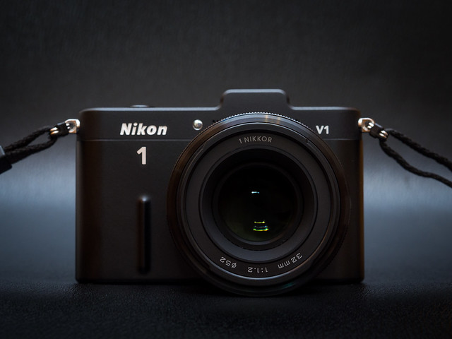 Nikon 1 Nikkor 32mm F1.2 and Nikon 1 V1 front view