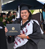 A Hawai‘i Community College graduate leaves the stage with her diploma during the commencement ceremony at the Pālamanui campus in Kailua-Kona on Saturday, May 13, 2017. 

View more photos: <a href="https://www.flickr.com/photos/53092216@N07/sets/72157681108098012">www.flickr.com/photos/53092216@N07/sets/72157681108098012</a>