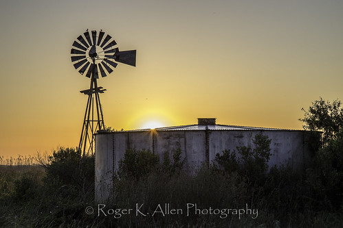 brazoria natiional wildlife refuge windmill aeromotor sun sunrise orange blue water tank