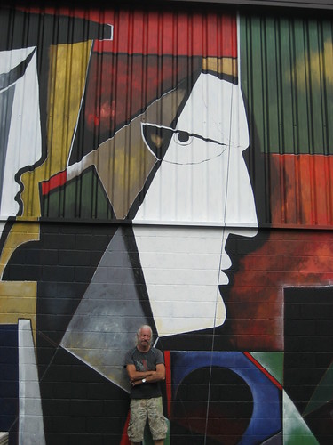Angular mural faces on a corrugated wall