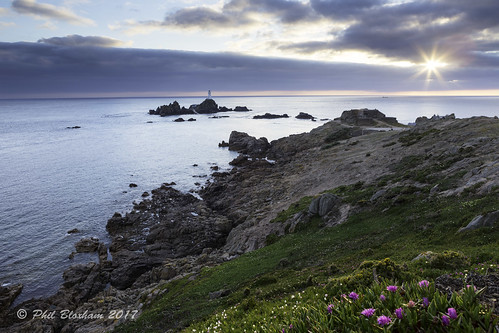 jersey coast rock sea seascape stunning sundown sunset seaside englishchannel serene peaceful mesembryanthemum