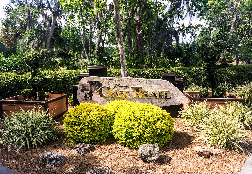 Oak Trail sign and topiaries
