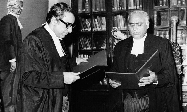 Acting Governor of Sindh Justice Abdul Kadir Shaikh giving the oath of office to Justice Zaffar Hussain Mirza.