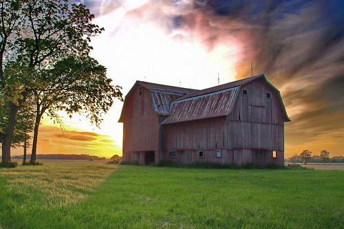 psychedelic barn field sunset
