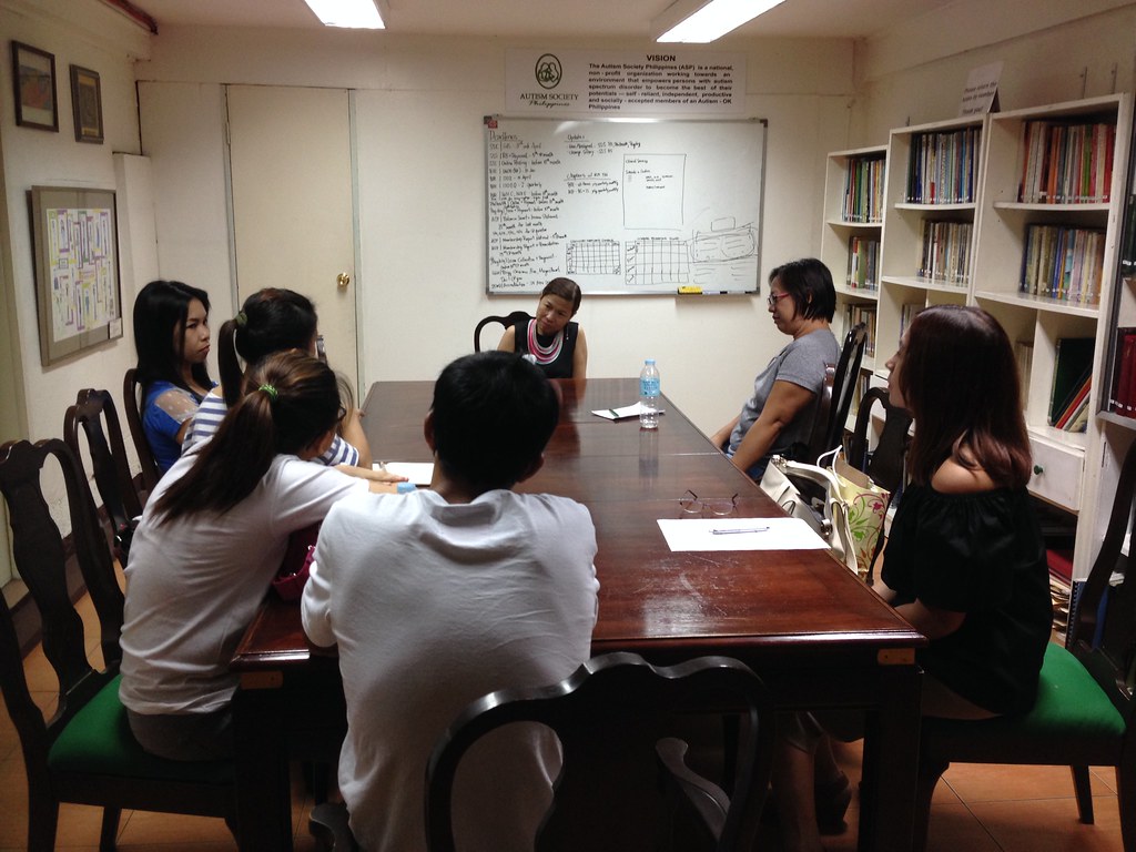 The image shows participants attending Family Support Group facilitated by Ms. Chrissy Roa.