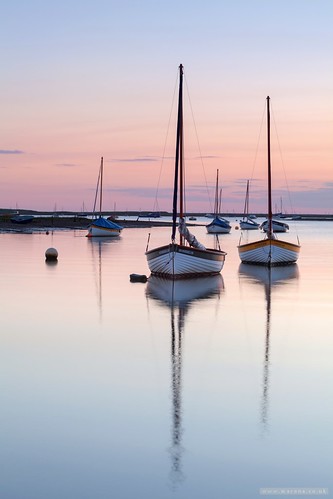 northnorfolkdistrict england unitedkingdom morstonquay norfolk sunrise landscape boat water sky serene sea reflections