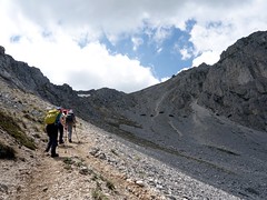 Approaching the summit cliffs on a scree trail