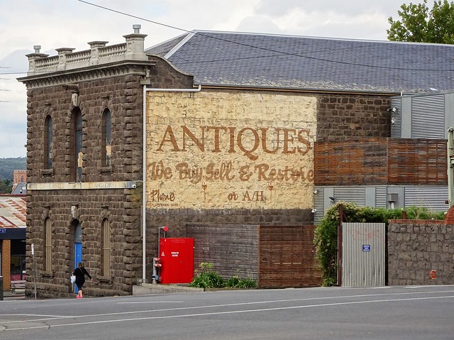 Ballarat. Old warehouse from the 1880s. Used as an antique centre about 40 years ago and now empty. Made of local volcanic basalt stone with slate roof