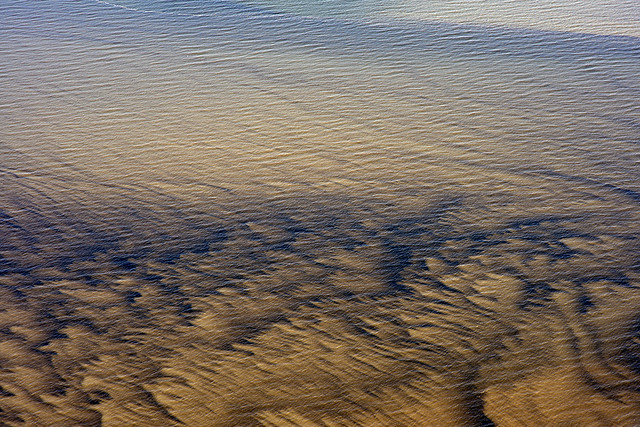 Aerial view of mud plumes in the Salton Sea, Imperial County, California