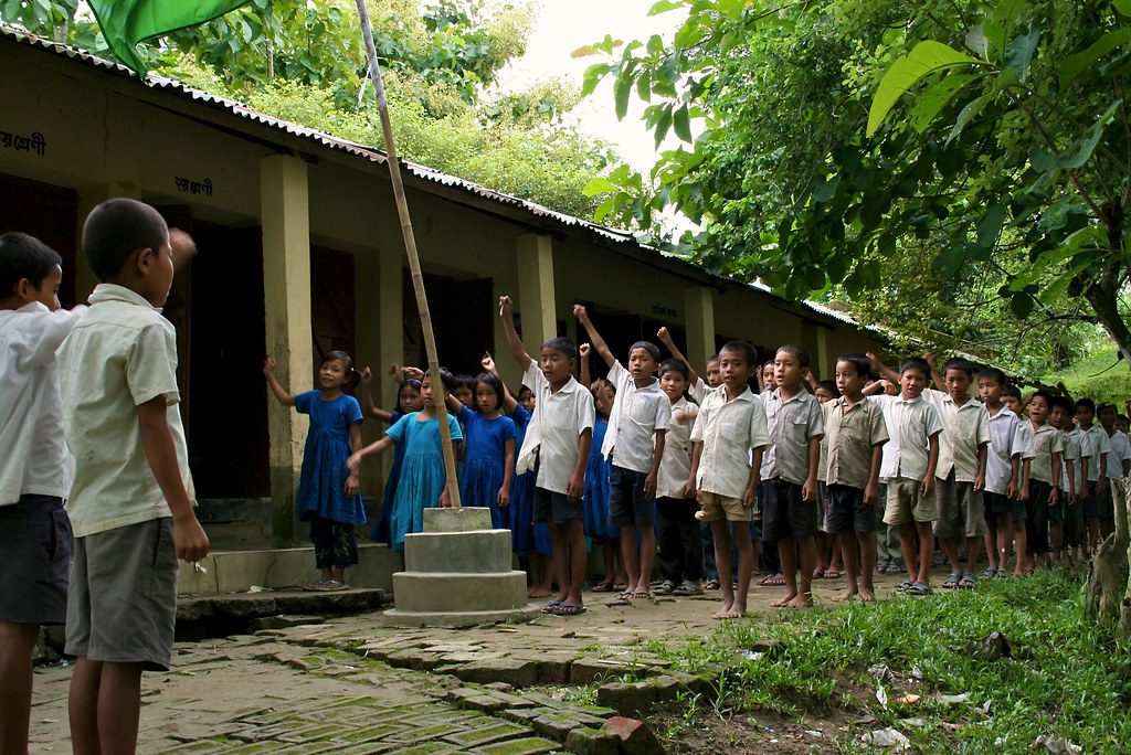 Bangladeshi school students say a student pledge in a remote Bangladesh village.