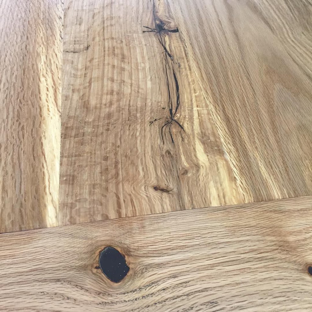 Black epoxy filler in a pin oak table top. The contrast is…