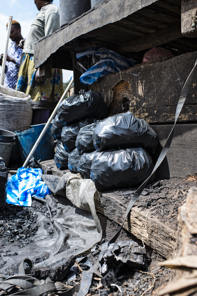 Charcoal-seller in Mokolo Market, Yaoundé, Cameroon.