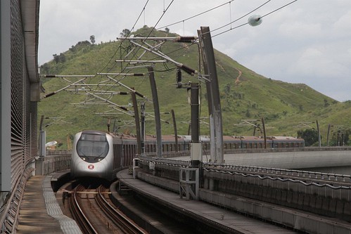 Tuen Mun bound train approaches at Tin Shui Wai station