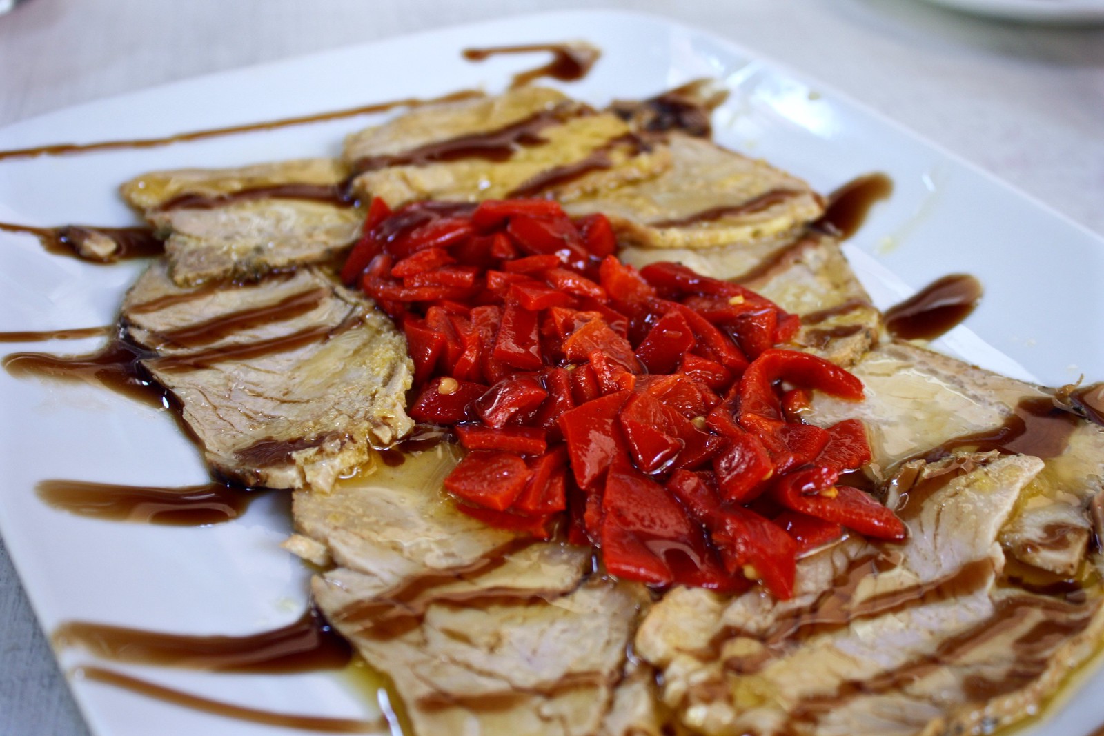 Pork loin with roasted red peppers in Jaén, Spain