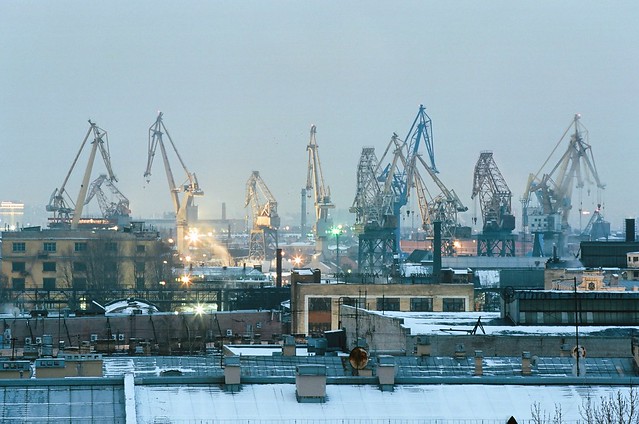 Through rooftops to Galerny island cranes. Saint Petersburg, Russia 2017