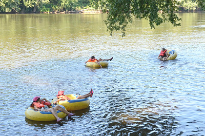 group of people tubing on the river