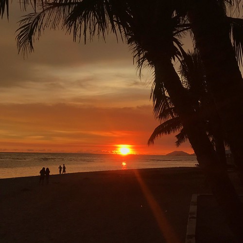 morong bataan dusk sky orange red light shadows silhouette trees sand ocean sea philippines sunset
