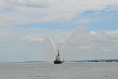 Tilbury tug squirts water