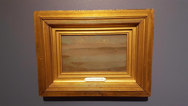 tiny painting in a shiny frame