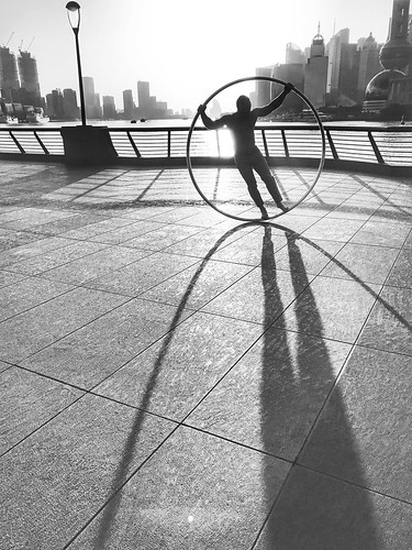 shotoniphone shotoniphone7 iphone7 iphone circle acrobat man sun cityscape city shadow sunrise street urban china shanghai bund