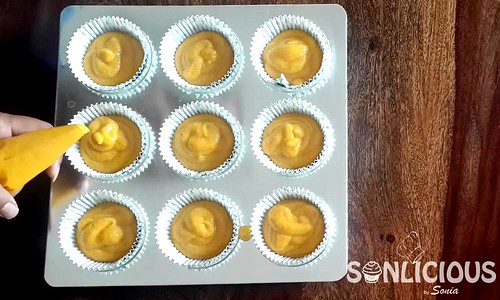 Muffin liners with mango semolina batter