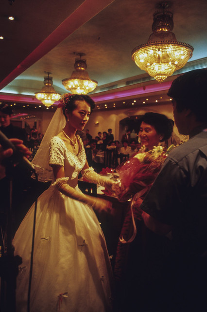 Bride at hotel wedding reception Shanghai 1999