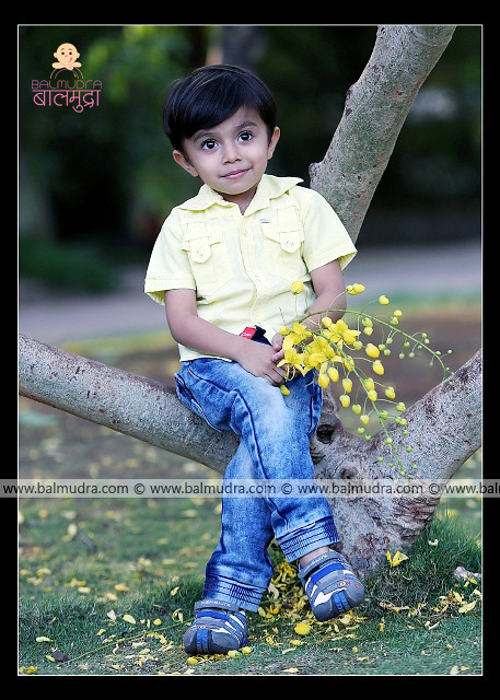 Very Cute , Smart  Kid posing  for Camera  in Balmudra Studio Pune shoot done by Photographer Shrikrishna Paranjpe