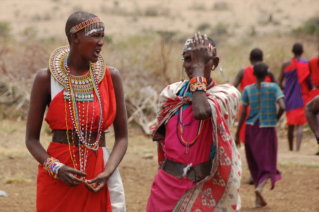 Maasai women engaged in conversation. Kenya.
